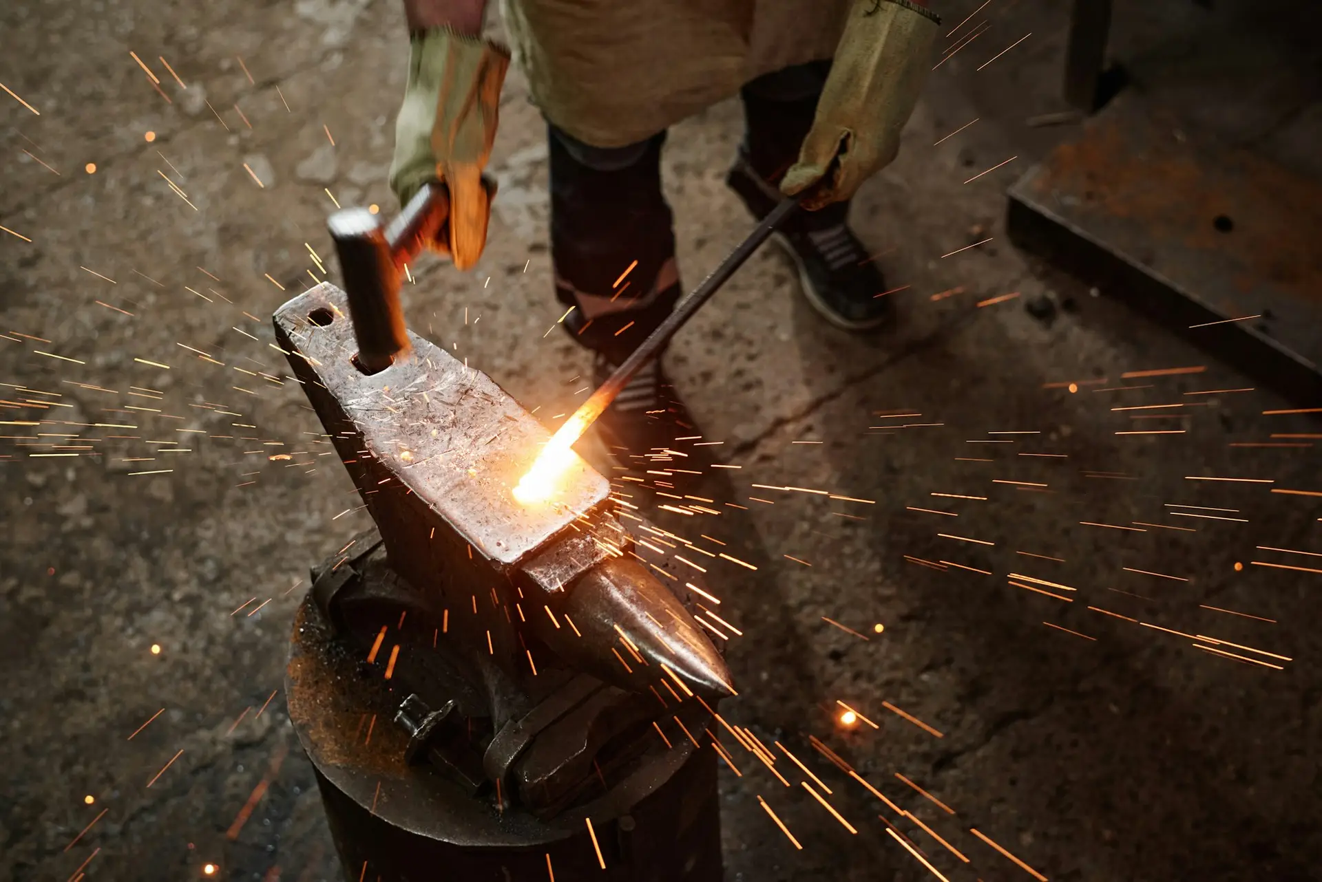 Smith forging the iron